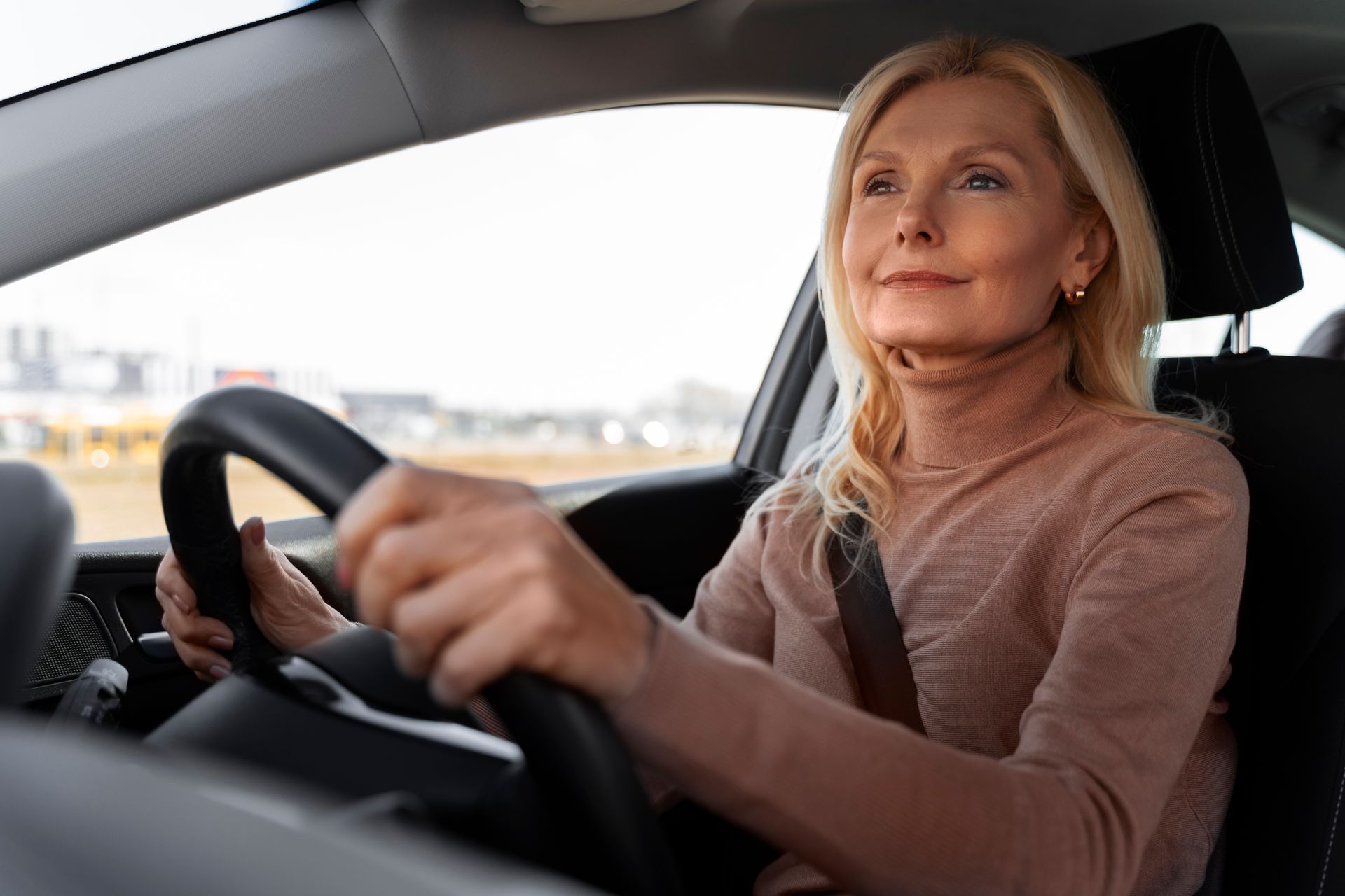A learner driver feeling calm and confident behind the wheel